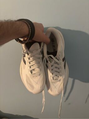 New Balance White Sneakers with Black Logo lacrosse turf shoes W 8.5, men 7
